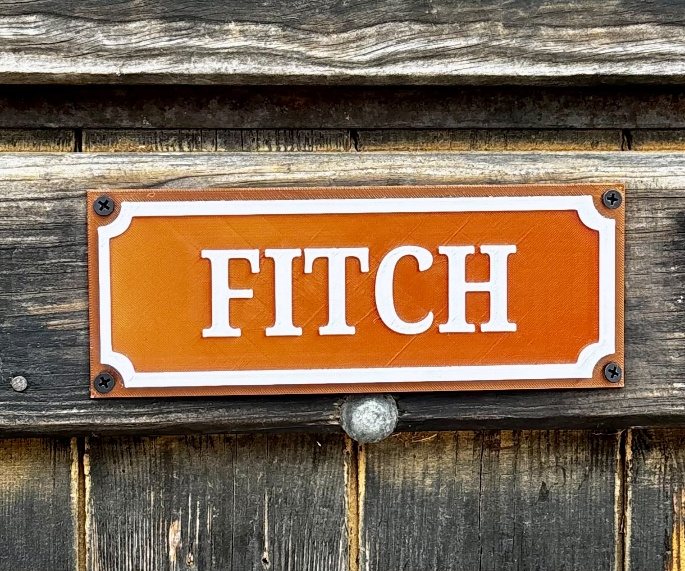 Placa de puerta de box